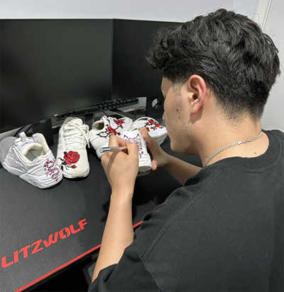 Qambari customising sneaker